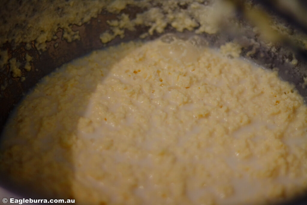 Seperated buttermilk ready to strain from the butter